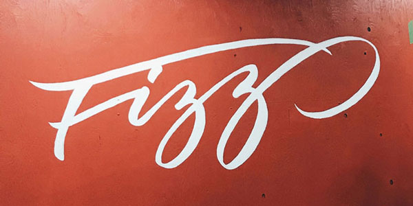 'Fizz' logo painted on wall
