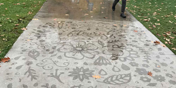 sidewalk art at UBC that shows up when it rains